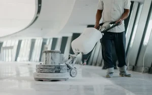 Cleaner using an electric floor buffer