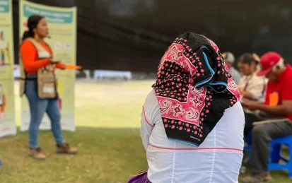 A female worker at a Verité training session