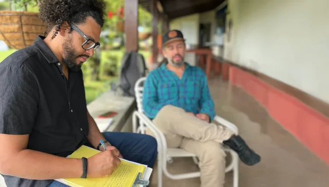 Researcher taking notes