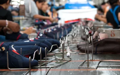 People working on the production line at a shoe factory