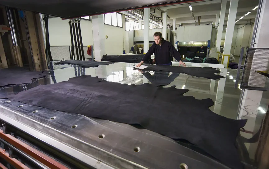 man in leather factory