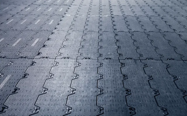 Surface made from rubber tiles