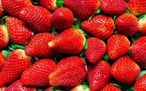A pile of fresh strawberries