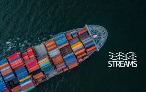 Overhead shot of a cargo ship with colourful containers