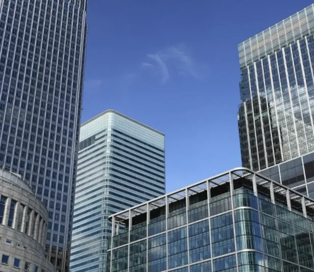 Office blocks against a blue sky