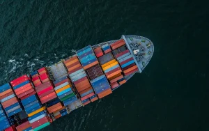 Cargo ship stacked with shipping containers